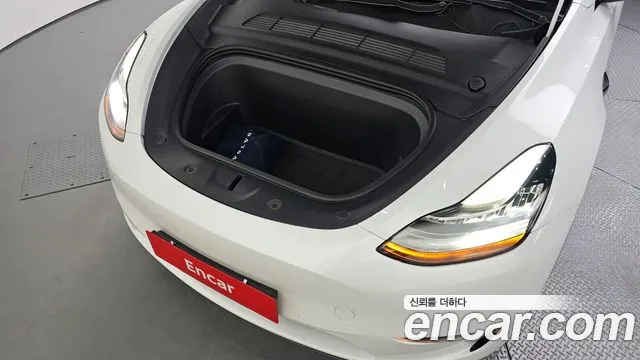 Tesla Model Y — Фото автомобиля 6