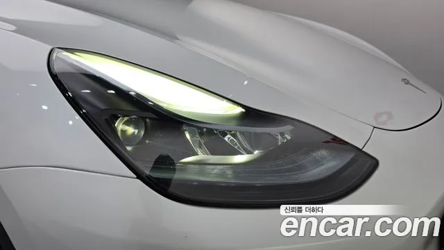 Tesla Model Y — Фото автомобиля 7