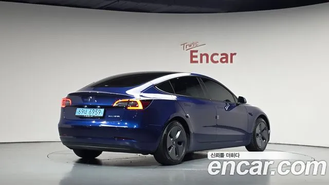 Tesla Model 3 — Фото автомобиля 2