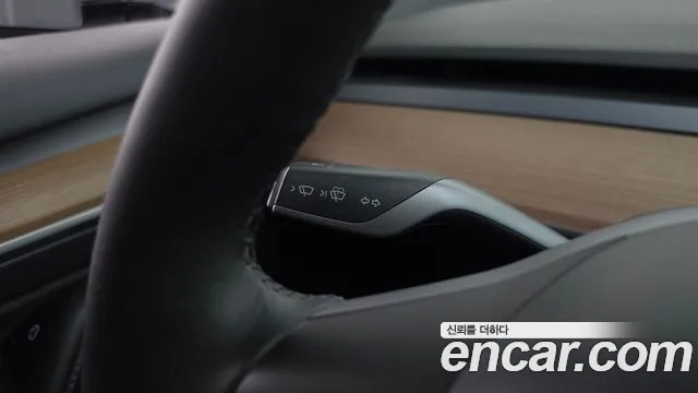 Tesla Model 3 — Фото автомобиля 24