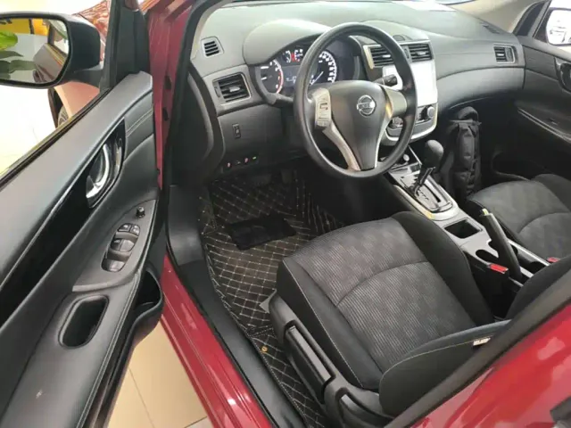 Nissan Tiida — Фото автомобиля 15