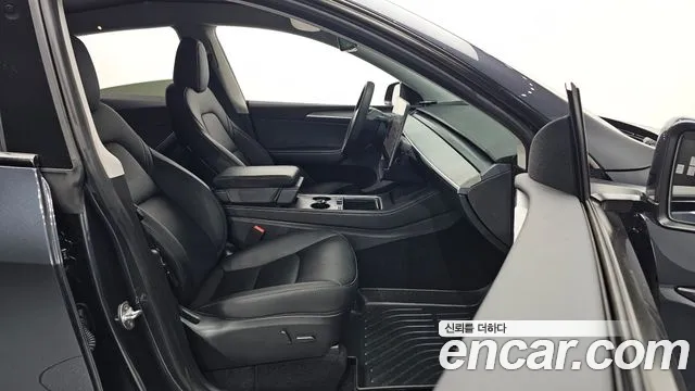 Tesla Model Y — Фото автомобиля 26