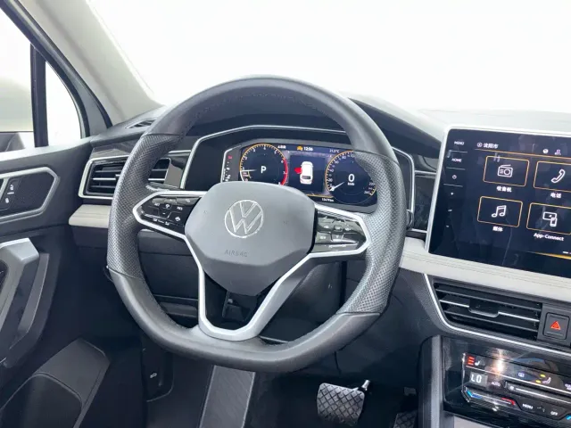 Volkswagen Tiguan L — Фото автомобиля 13