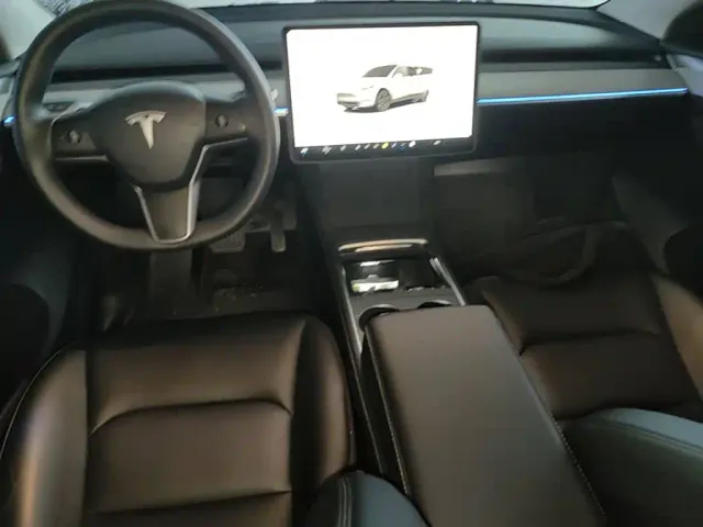 Tesla Model Y — Фото автомобиля 9