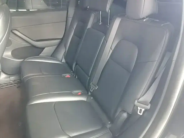 Tesla Model Y — Фото автомобиля 16