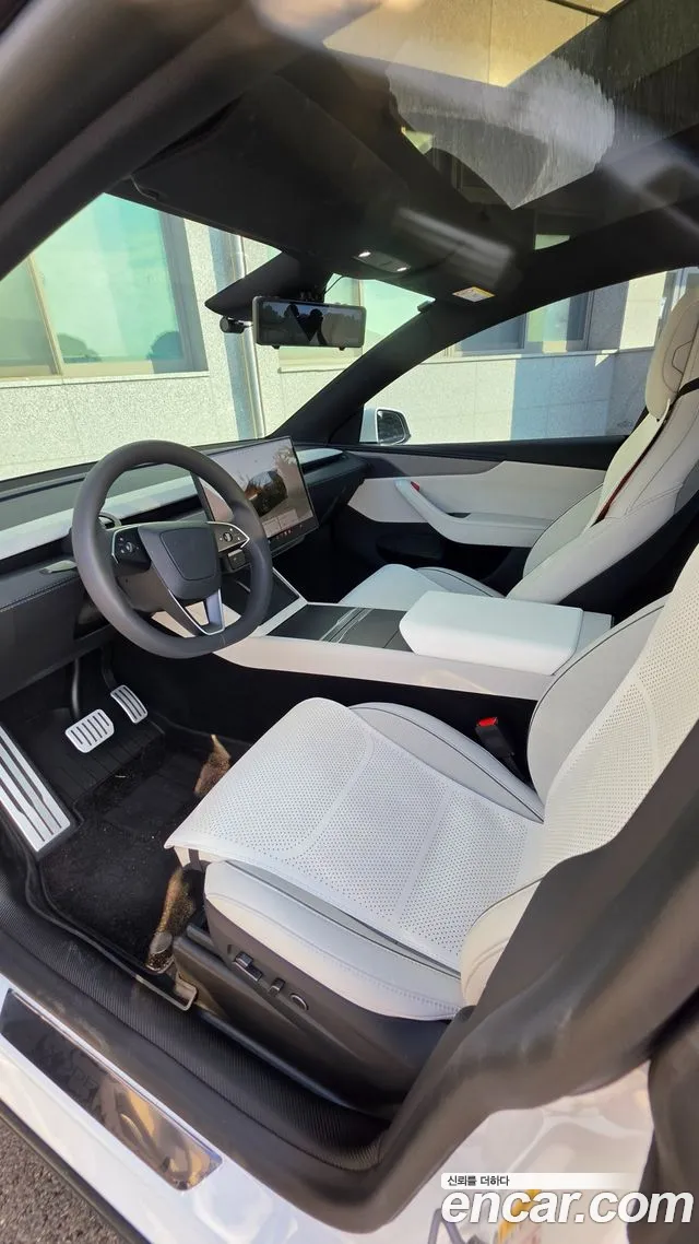 Tesla Model Y — Фото автомобиля 14