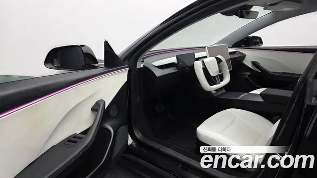 Tesla Model 3 — Фото автомобиля 15
