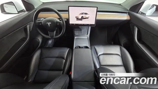 Tesla Model Y — Фото автомобиля 7