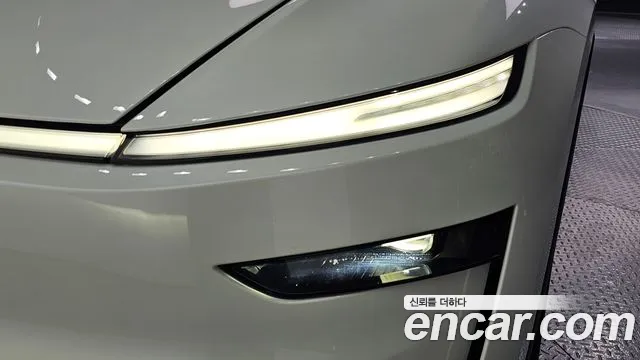 Tesla Model Y — Фото автомобиля 7