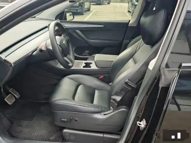 Tesla Model Y — Фото автомобиля 5