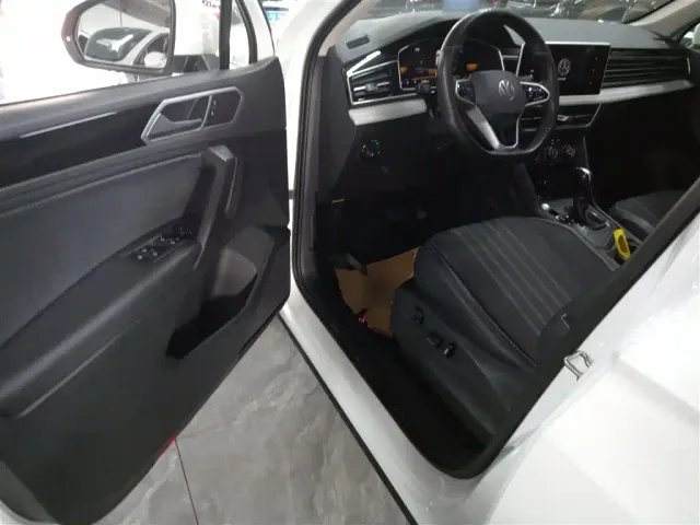 Volkswagen Tiguan L — Фото автомобиля 12