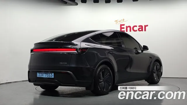 Tesla Model Y — Фото автомобиля 2