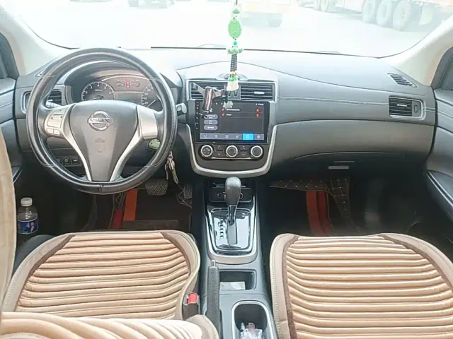 Nissan Tiida — Фото автомобиля 9