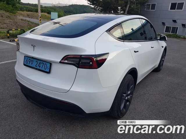 Tesla Model Y — Фото автомобиля 4