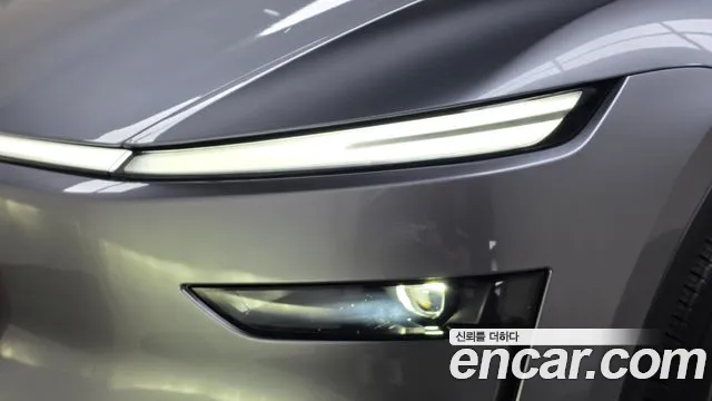 Tesla Model Y — Фото автомобиля 21
