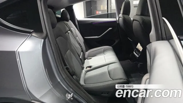 Tesla Model Y — Фото автомобиля 17