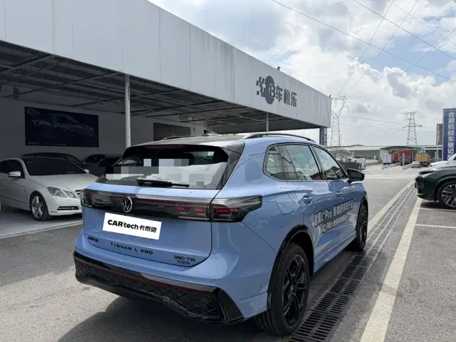 Volkswagen Tiguan L — Фото автомобиля 12