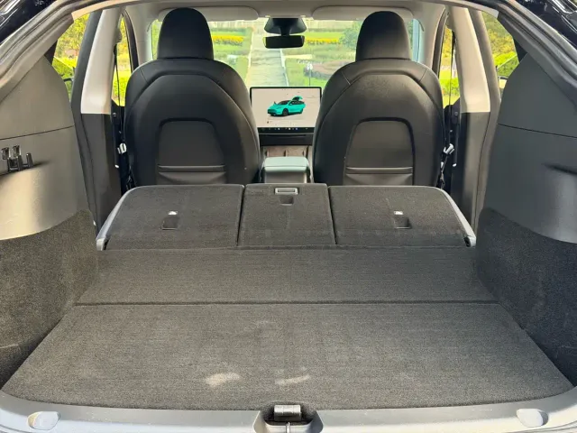 Tesla Model Y — Фото автомобиля 11