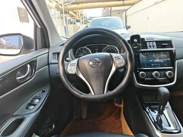 Nissan Tiida — Фото автомобиля 11