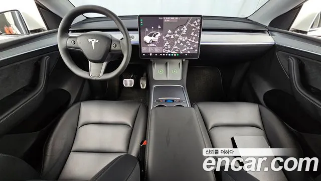 Tesla Model Y — Фото автомобиля 7