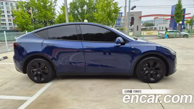 Tesla Model Y — Фото автомобиля 2