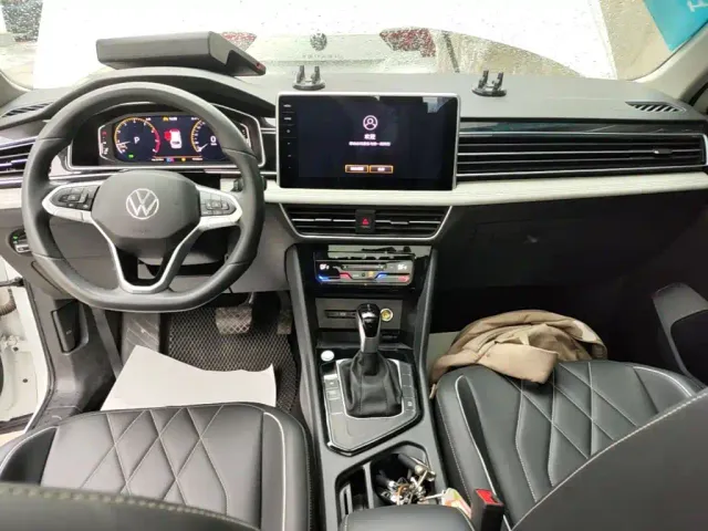 Volkswagen Tiguan L — Фото автомобиля 9