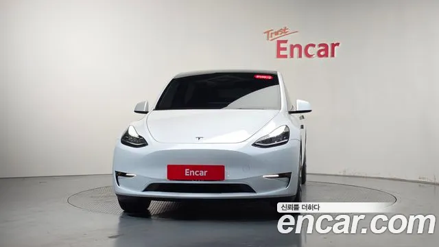 Tesla Model Y — Фото автомобиля 3