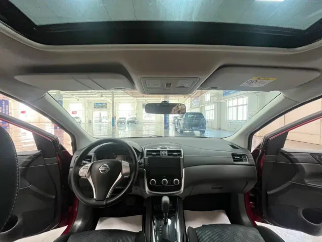 Nissan Tiida — Фото автомобиля 11
