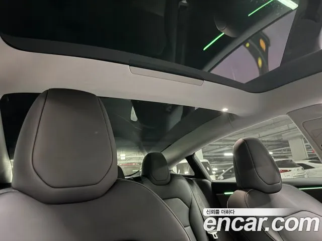 Tesla Model 3 — Фото автомобиля 12