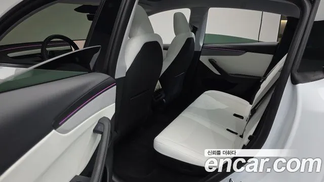 Tesla Model Y — Фото автомобиля 15