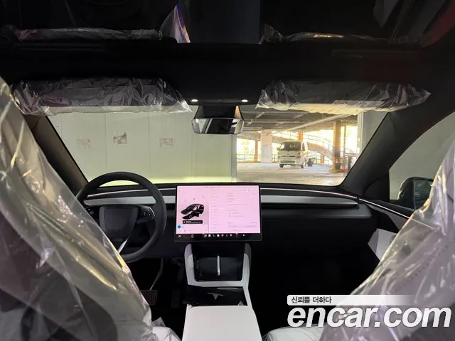 Tesla Model Y — Фото автомобиля 7