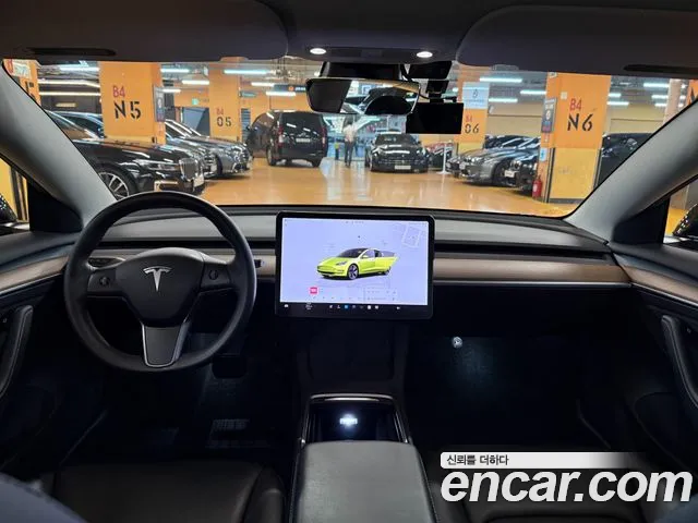 Tesla Model 3 — Фото автомобиля 15