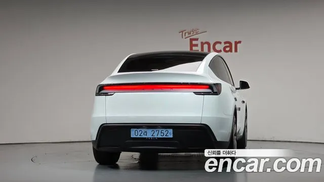 Tesla Model Y — Фото автомобиля 3