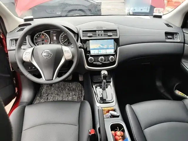 Nissan Tiida — Фото автомобиля 9