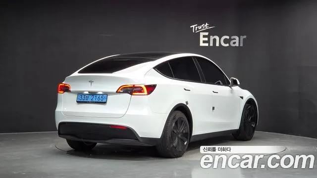 Tesla Model Y — Фото автомобиля 2