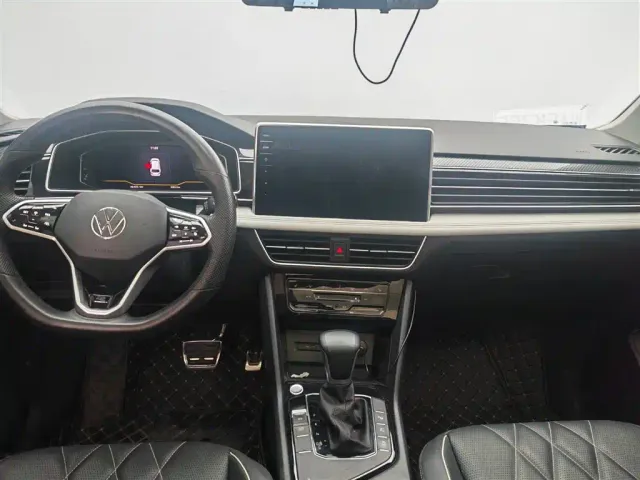 Volkswagen Tiguan L — Фото автомобиля 11