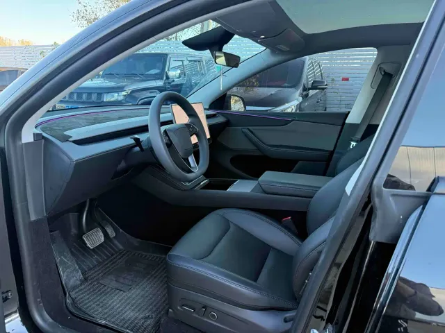 Tesla Model Y — Фото автомобиля 7