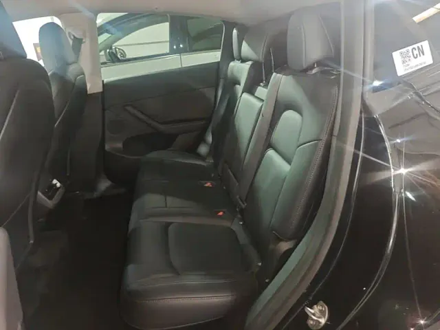 Tesla Model Y — Фото автомобиля 16