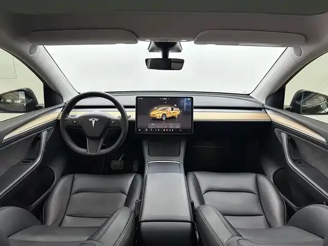 Tesla Model Y — Фото автомобиля 9