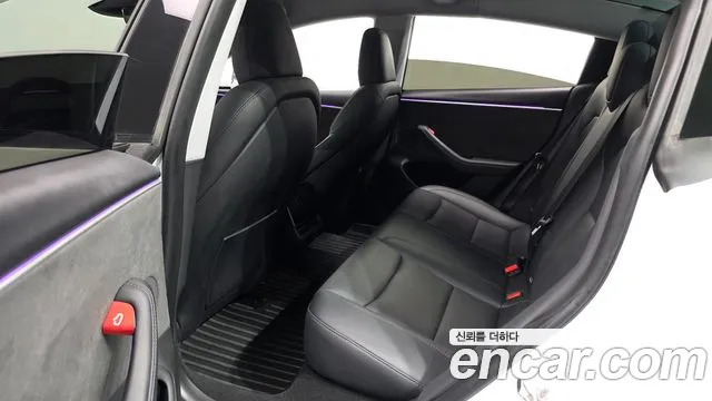 Tesla Model 3 — Фото автомобиля 11