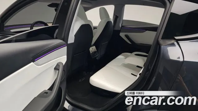 Tesla Model Y — Фото автомобиля 6