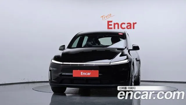 Tesla Model Y — Фото автомобиля 3