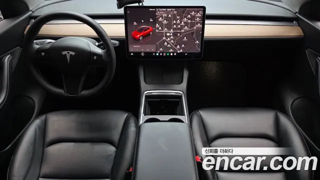 Tesla Model Y — Фото автомобиля 7