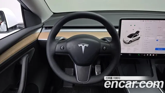 Tesla Model Y — Фото автомобиля 19