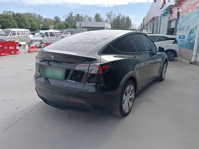 Tesla Model Y — Фото автомобиля 6