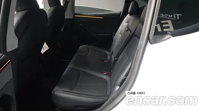Tesla Model Y — Фото автомобиля 16
