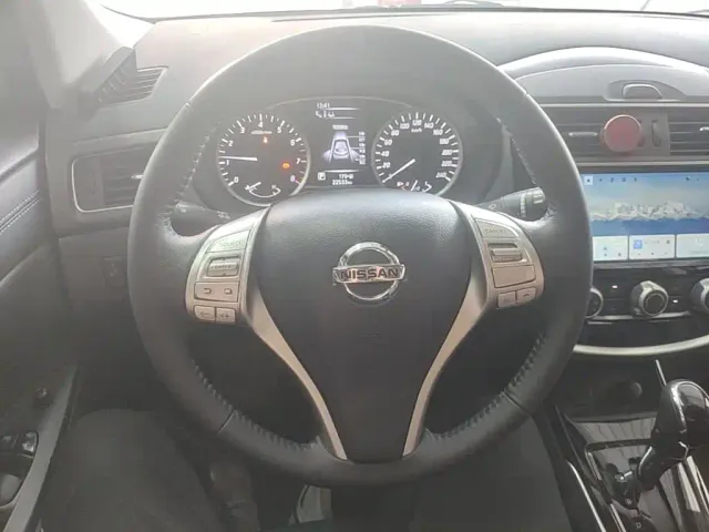 Nissan Tiida — Фото автомобиля 10