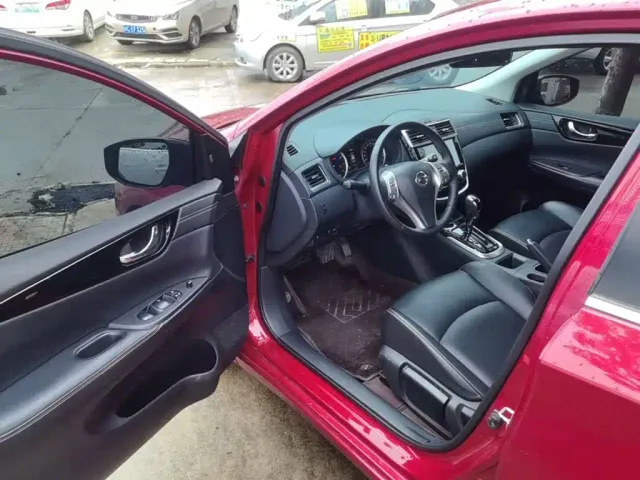 Nissan Tiida — Фото автомобиля 15