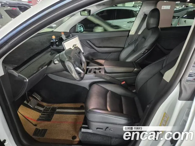 Tesla Model Y — Фото автомобиля 6