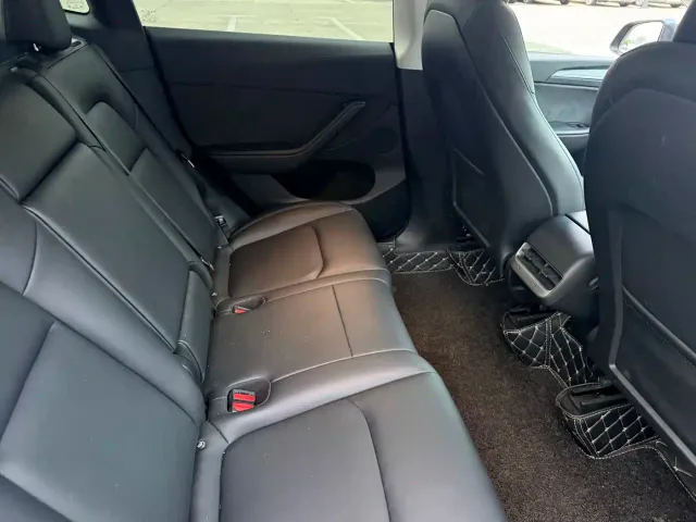 Tesla Model Y — Фото автомобиля 10